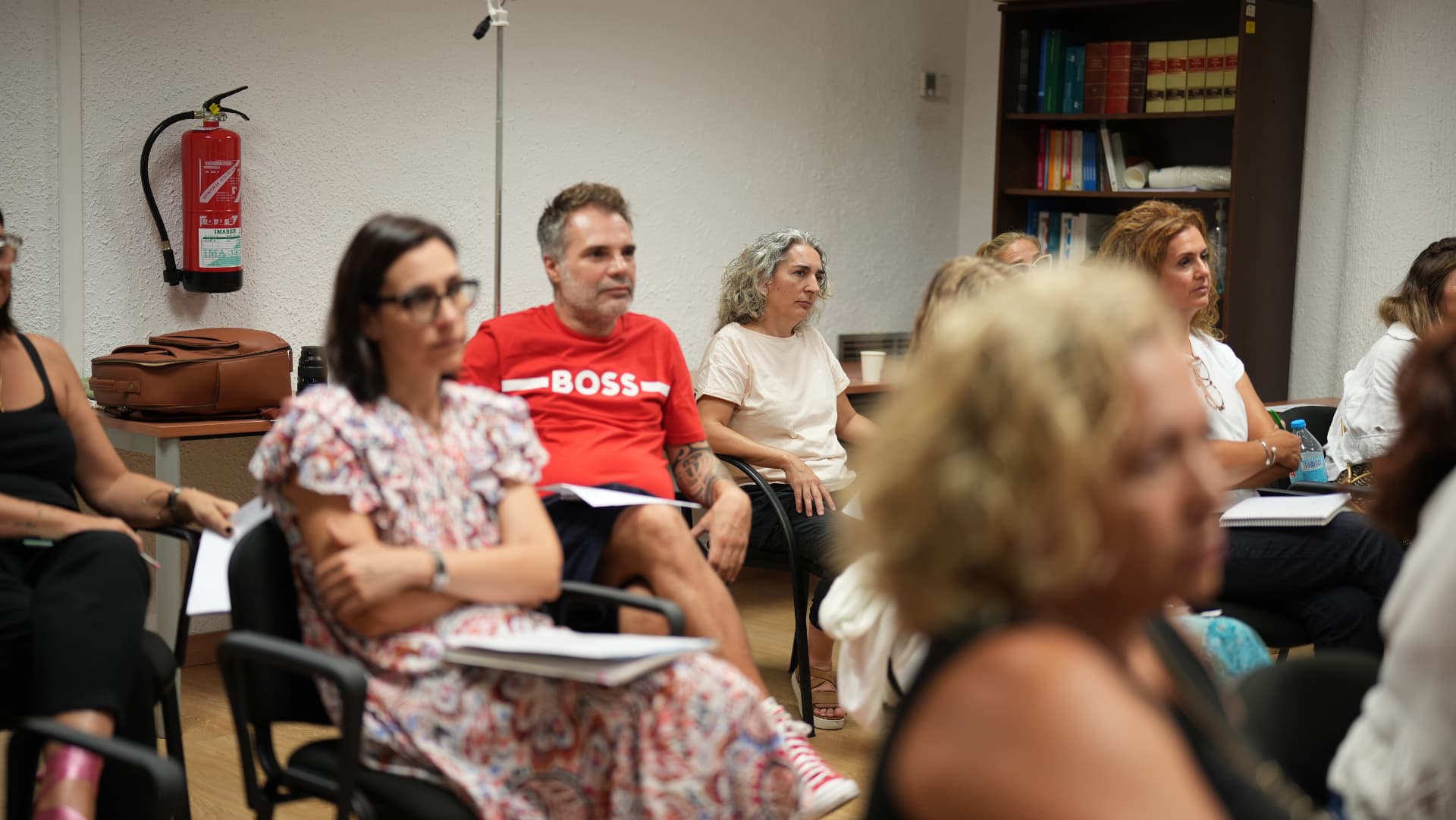 Profesionales asistentes a una formación de salud para empresas